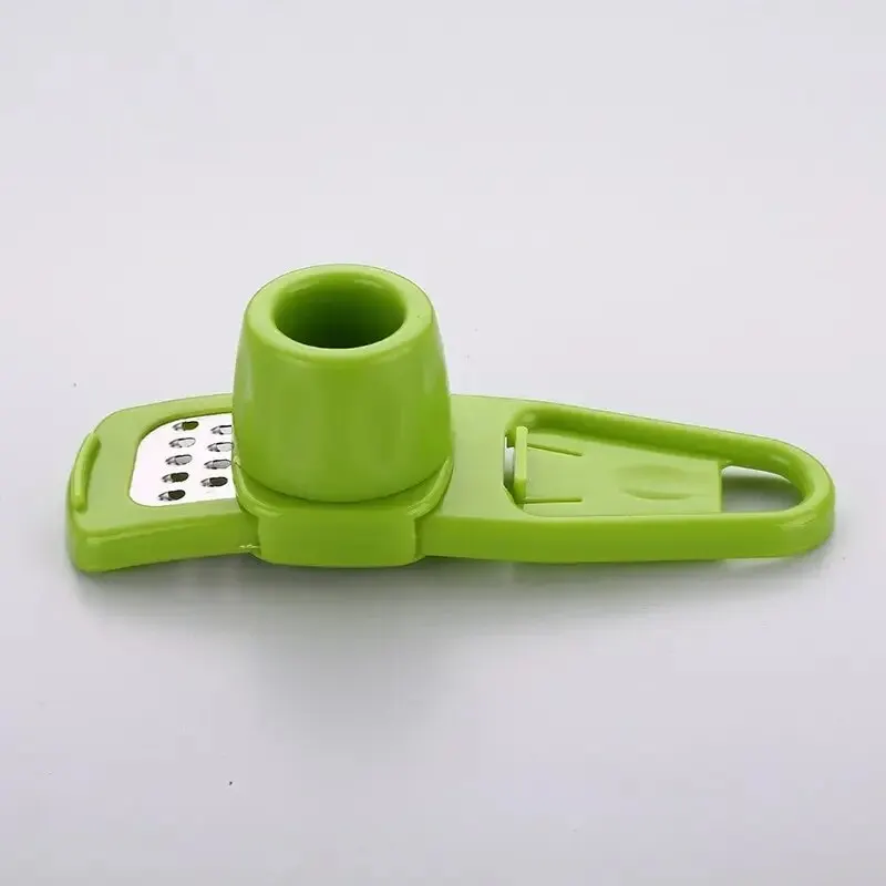 مفرمة ثوم صغيرة يدوية مبتكرة ل - مراجعة Kitchen Gadgets Green وسعره